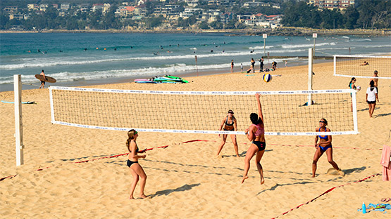 Women play beach volleyball at Manly Beach, Sydney