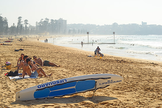 A lifeguard's rescue board lies ready at Manly Beach, Sydney