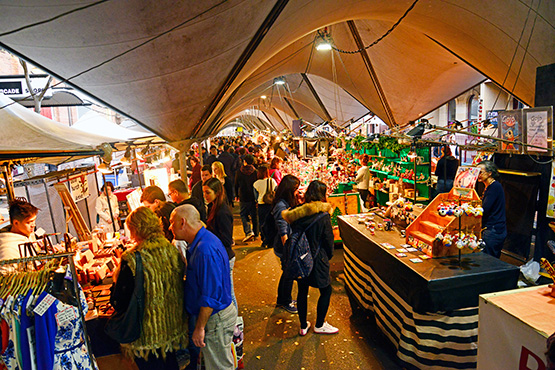 Stalls under the sails at The Rocks Market, Sydney